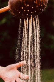 Short handle sand or water scoop, a kid-friendly tool for mud kitchens or play.
