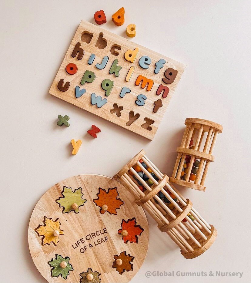 Wooden rainmaker toy in two sizes, a magical sensory and musical toy for kids.