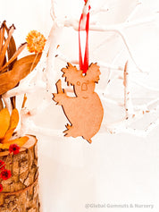 Koala Christmas Ornament: Wooden koala ornament for festive Australian-themed decor.