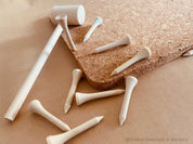 CORK and Tools Set: Kids’ wooden hammer and nail set with corkboard and wooden nails for creative crafting and playdough fun.