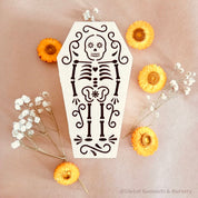 Wooden coffin, perfect for Halloween décor featuring sugar skull or skeleton themes.
