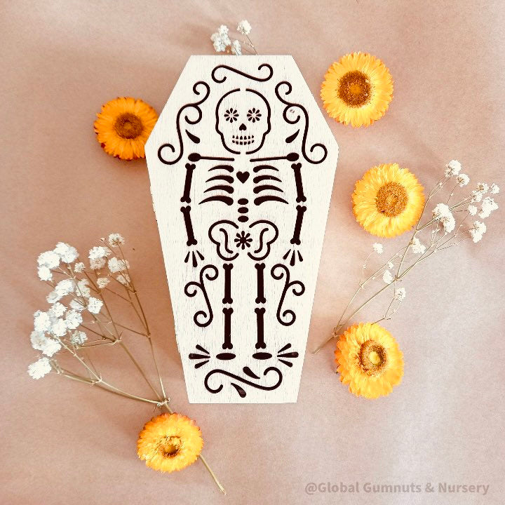 Wooden coffin, perfect for Halloween décor featuring sugar skull or skeleton themes.
