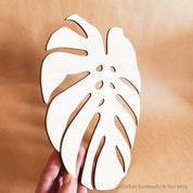 Monstera Leaf: Wooden monstera leaf decor for crafting or home design.
