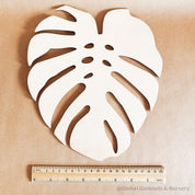 Monstera Leaf: Wooden monstera leaf decor for crafting or home design.
