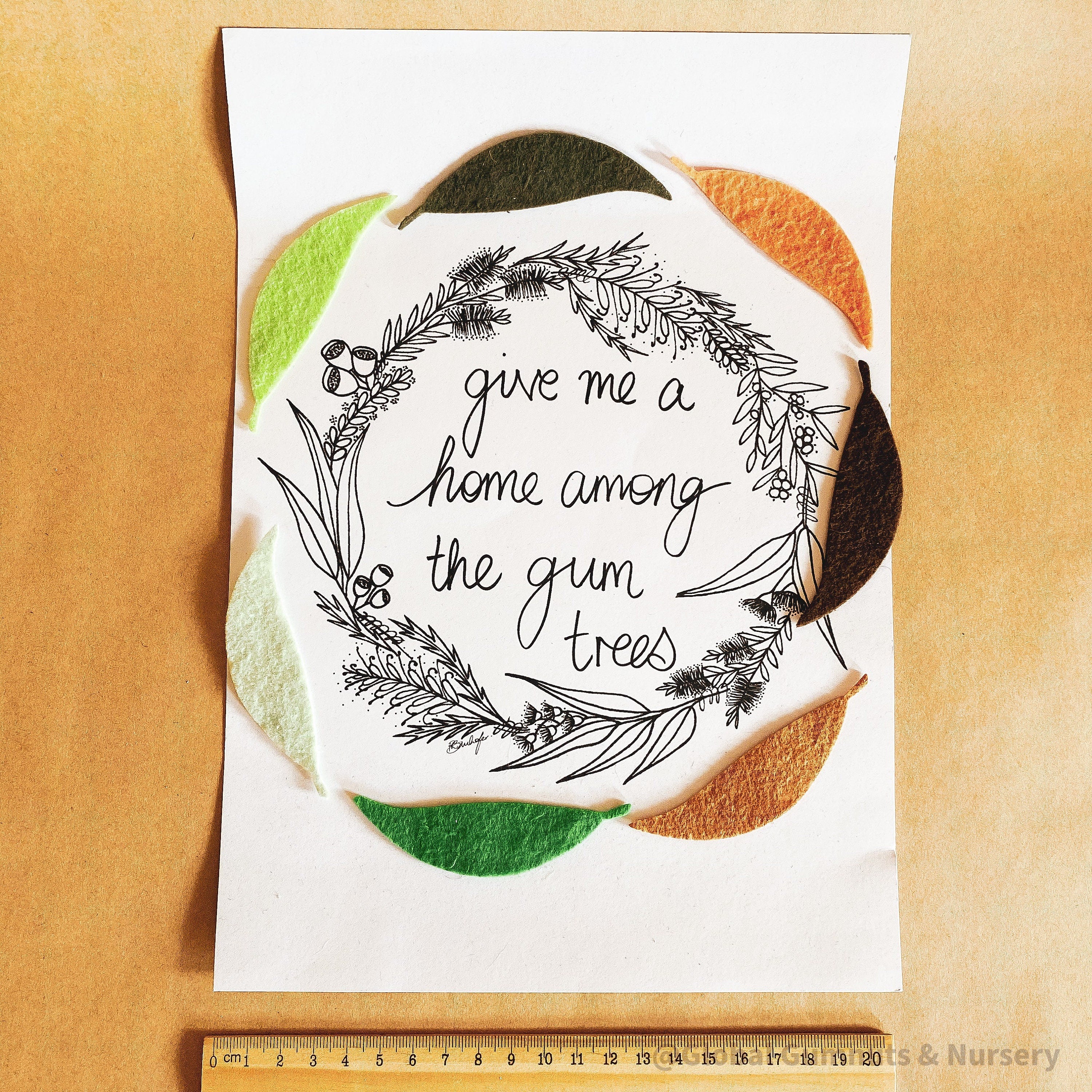 A4-sized "A Home Among the Gumtrees" decor print, perfect for Australian-inspired wall art or nostalgic home accents.