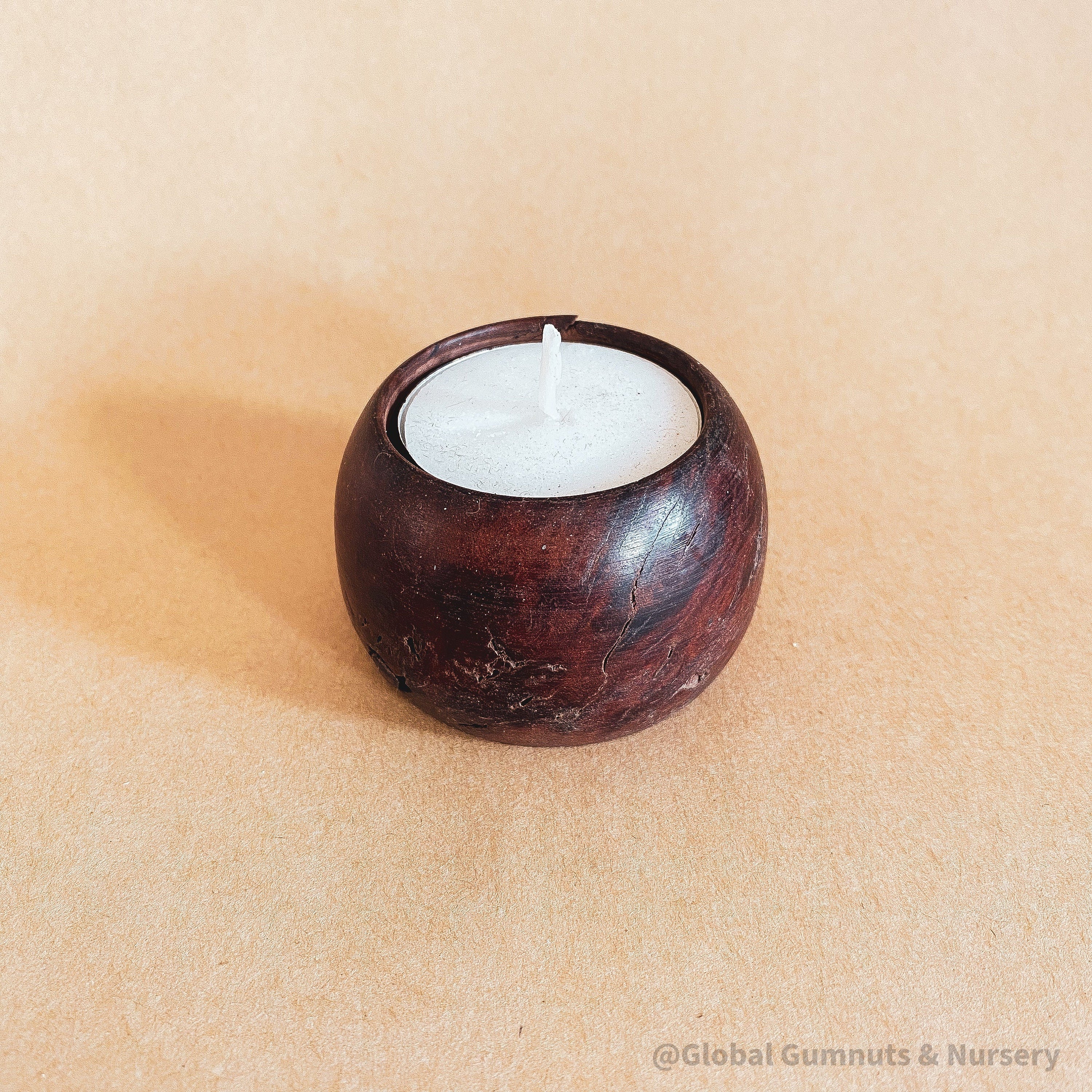 Jarrah Candle Holders: Handmade Australian tealight holders from Jarrah wood.