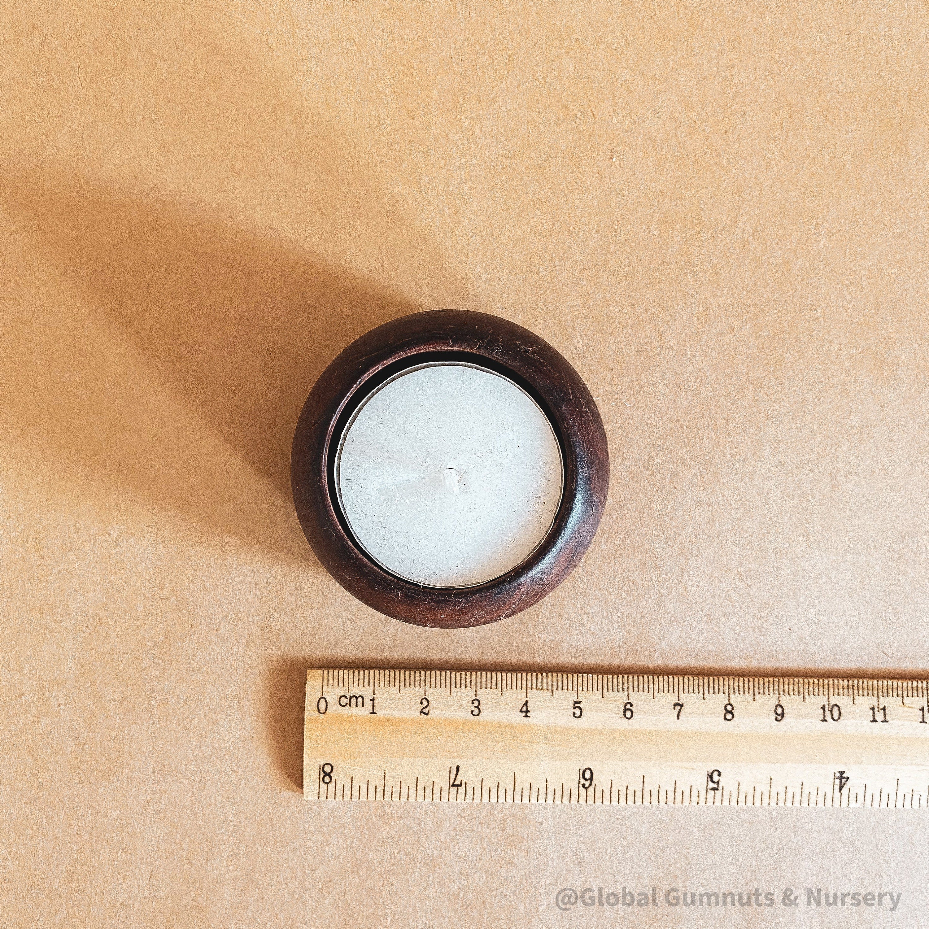 Jarrah Candle Holders: Handmade Australian tealight holders from Jarrah wood.