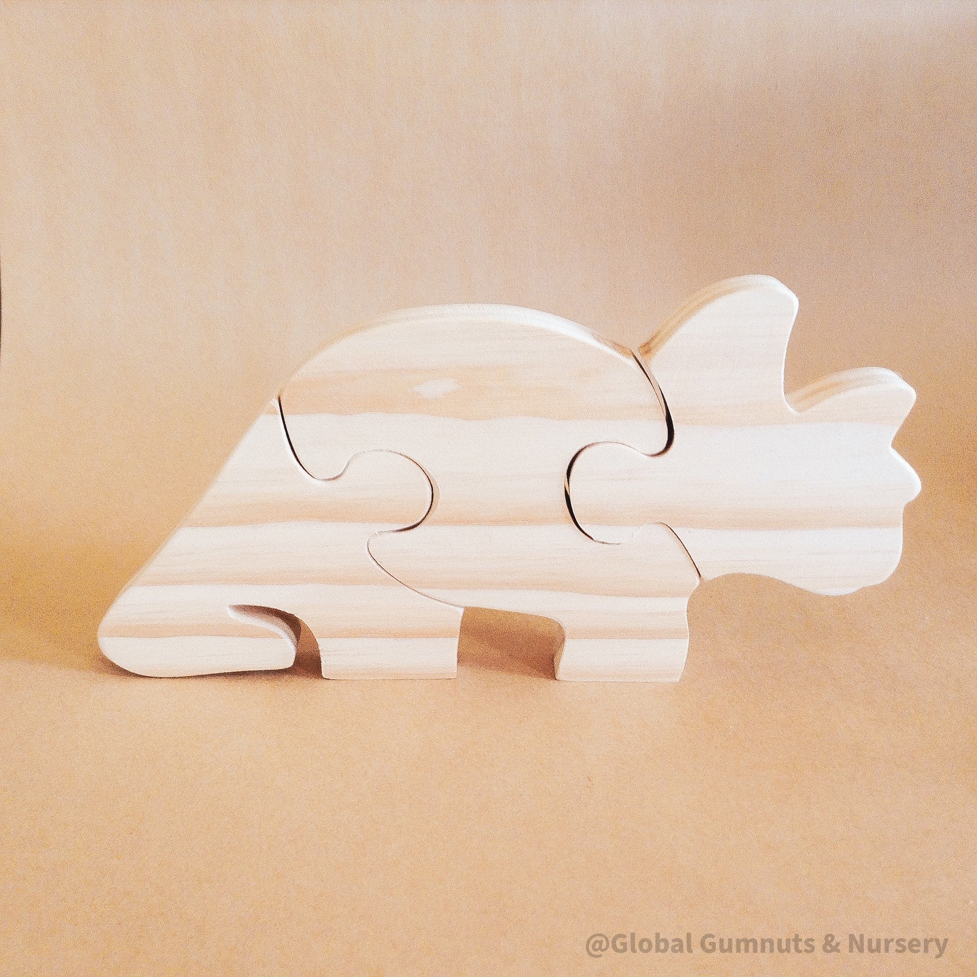 Stegosaurus Puzzle: Handmade, eco-friendly stegosaurus wooden puzzle.