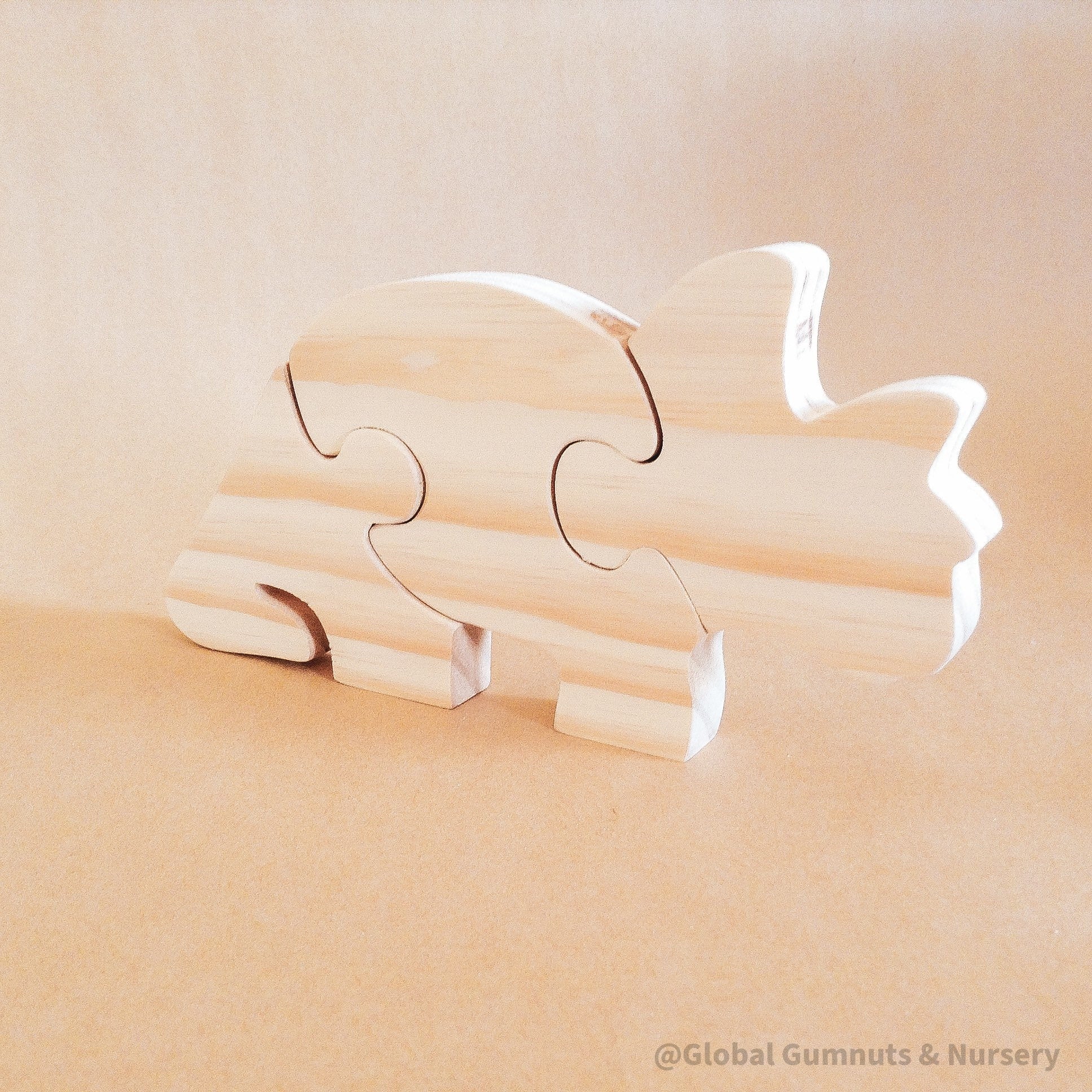 Stegosaurus Puzzle: Handmade, eco-friendly stegosaurus wooden puzzle.