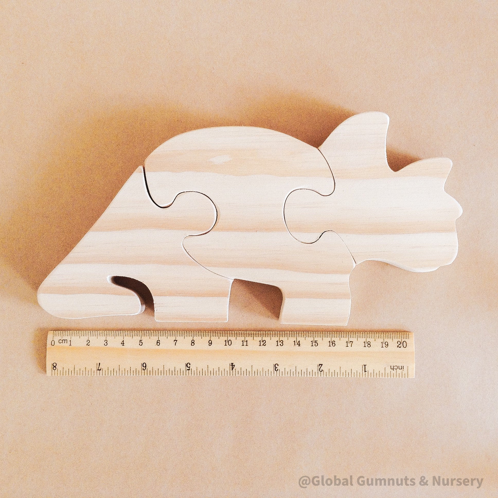 Stegosaurus Puzzle: Handmade, eco-friendly stegosaurus wooden puzzle.
