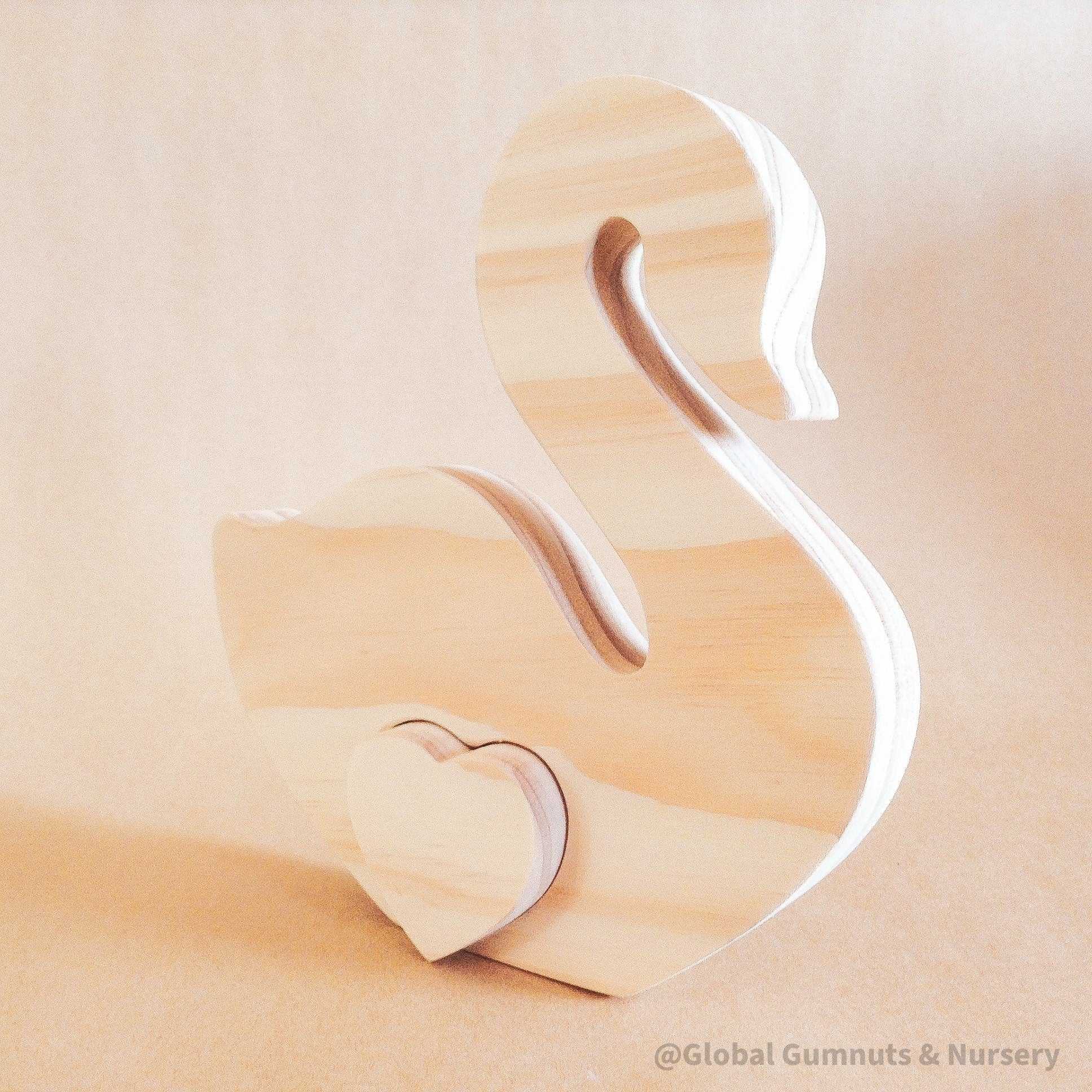 Wooden black swan puzzle toy, handmade and one-of-a-kind.