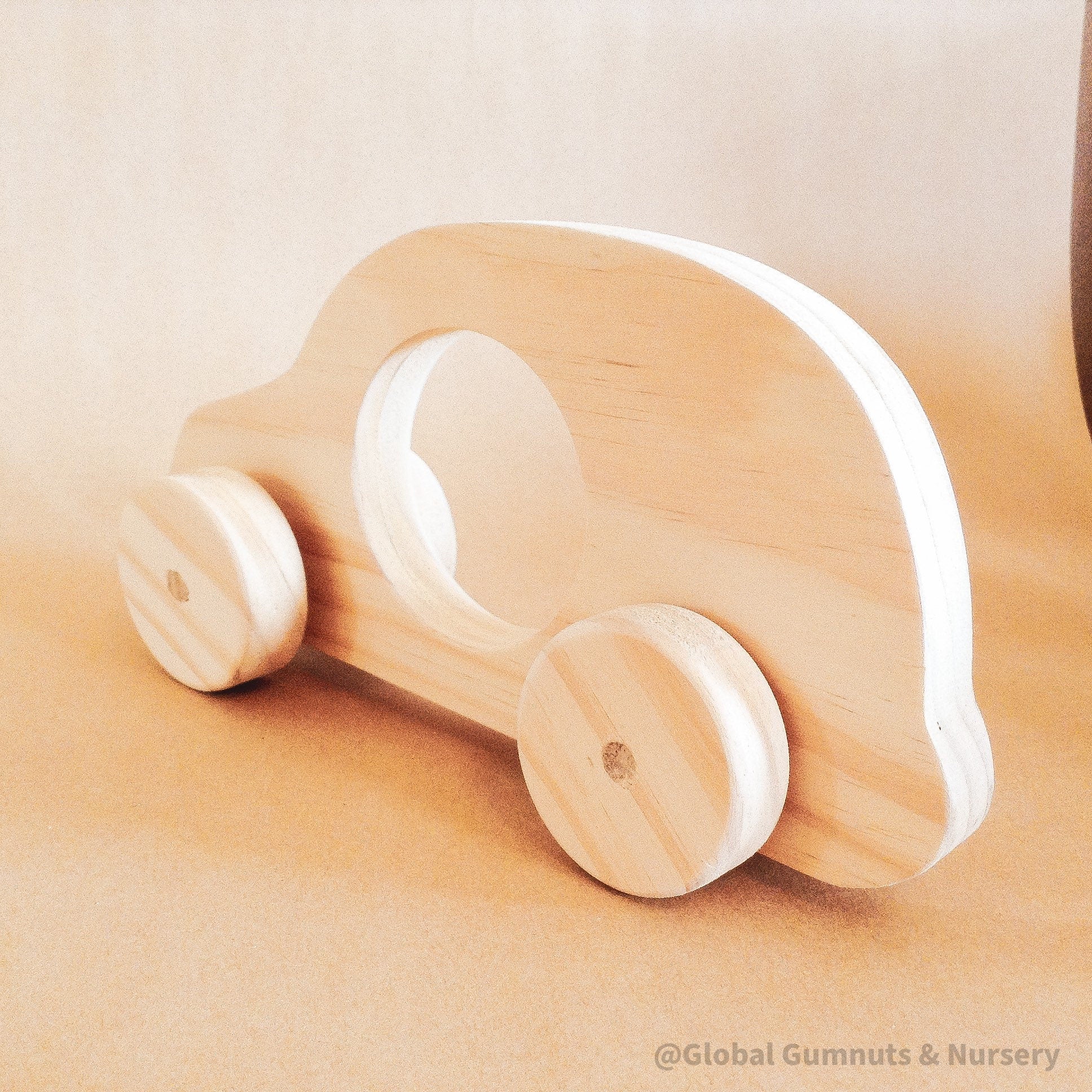 Wheeler Car with Window – Push Pull Toy: Wooden car with a clear window, designed for toddlers as a first vehicle toy.