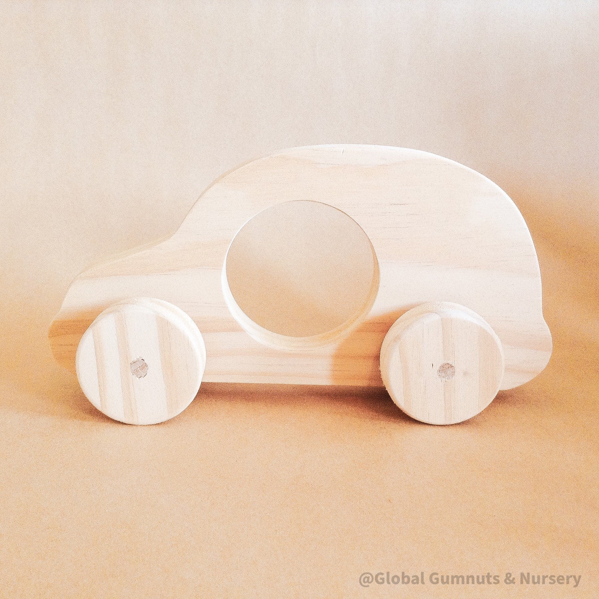Wheeler Car with Window – Push Pull Toy: Wooden car with a clear window, designed for toddlers as a first vehicle toy.