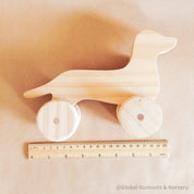 Wooden Dachshund Toy: Handmade wooden dachshund toy, perfect as a first pet gift.