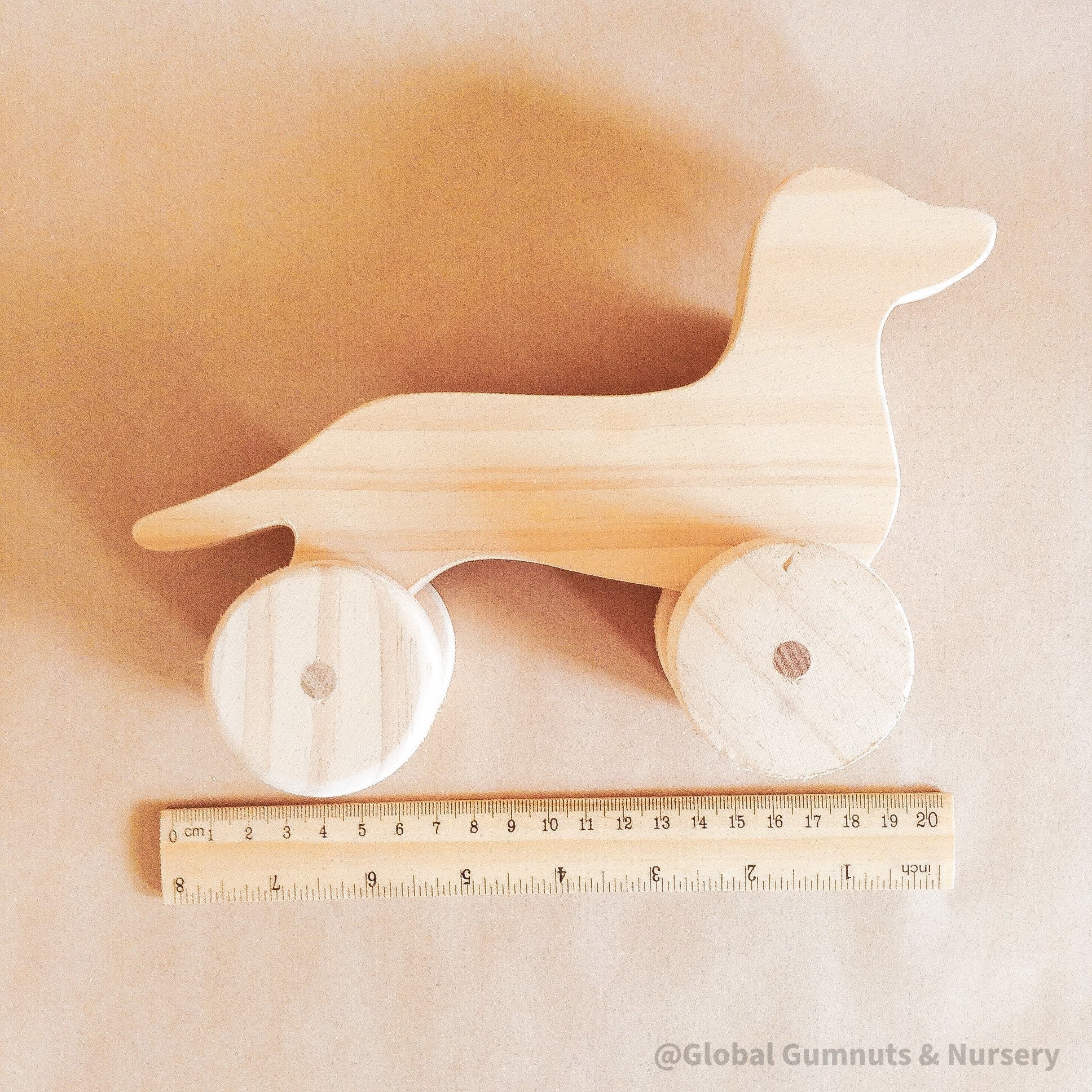 Wooden Dachshund Toy: Handmade wooden dachshund toy, perfect as a first pet gift.