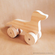 Wooden Dachshund Toy: Handmade wooden dachshund toy, perfect as a first pet gift.