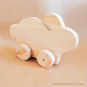 Handmade Wooden Bunny: Wooden bunny for Easter-themed play or decoration.