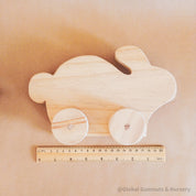 Handmade Wooden Bunny: Wooden bunny for Easter-themed play or decoration.