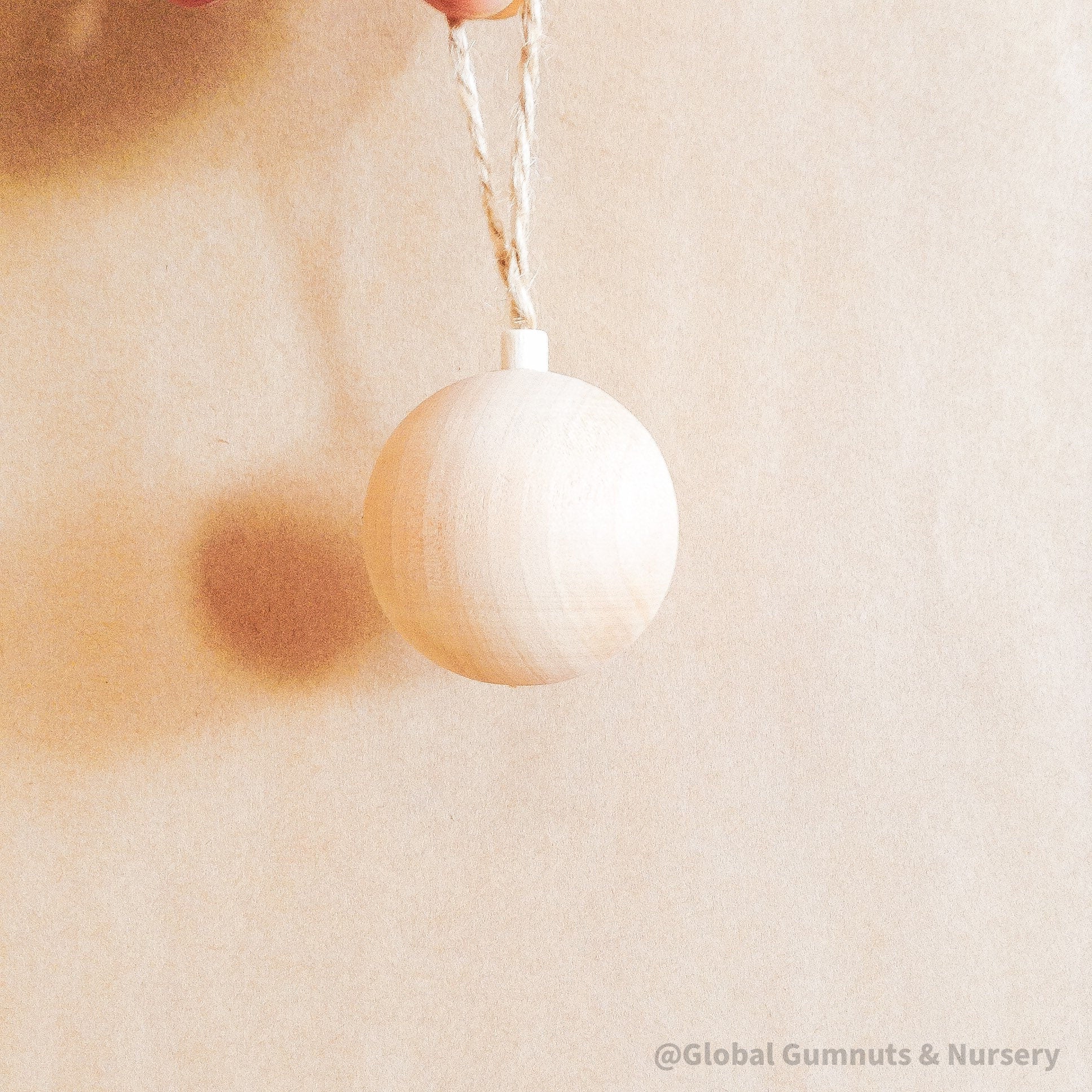 Wooden bell ornament, custom-made and personalized for Christmas.