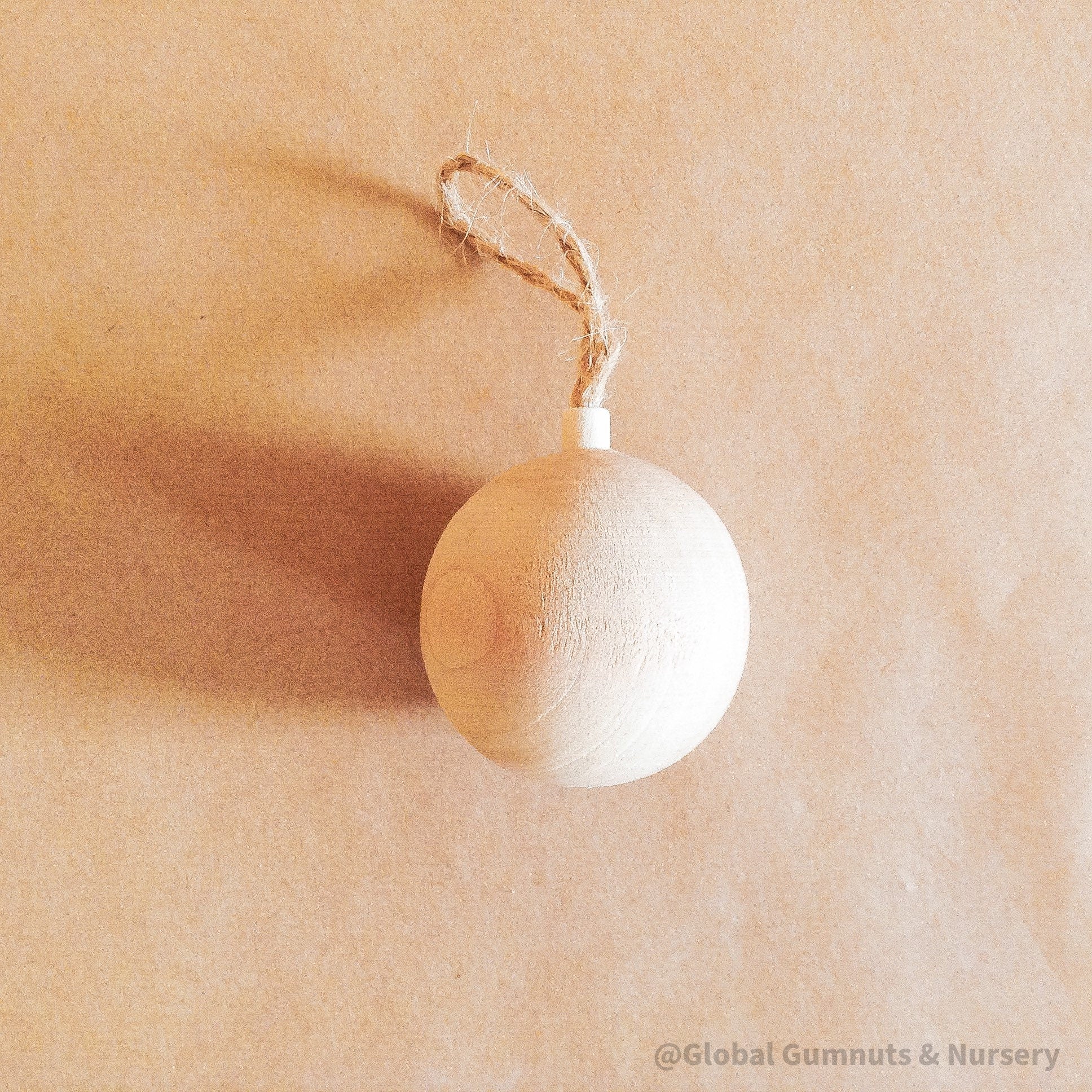 Wooden bell ornament, custom-made and personalized for Christmas.
