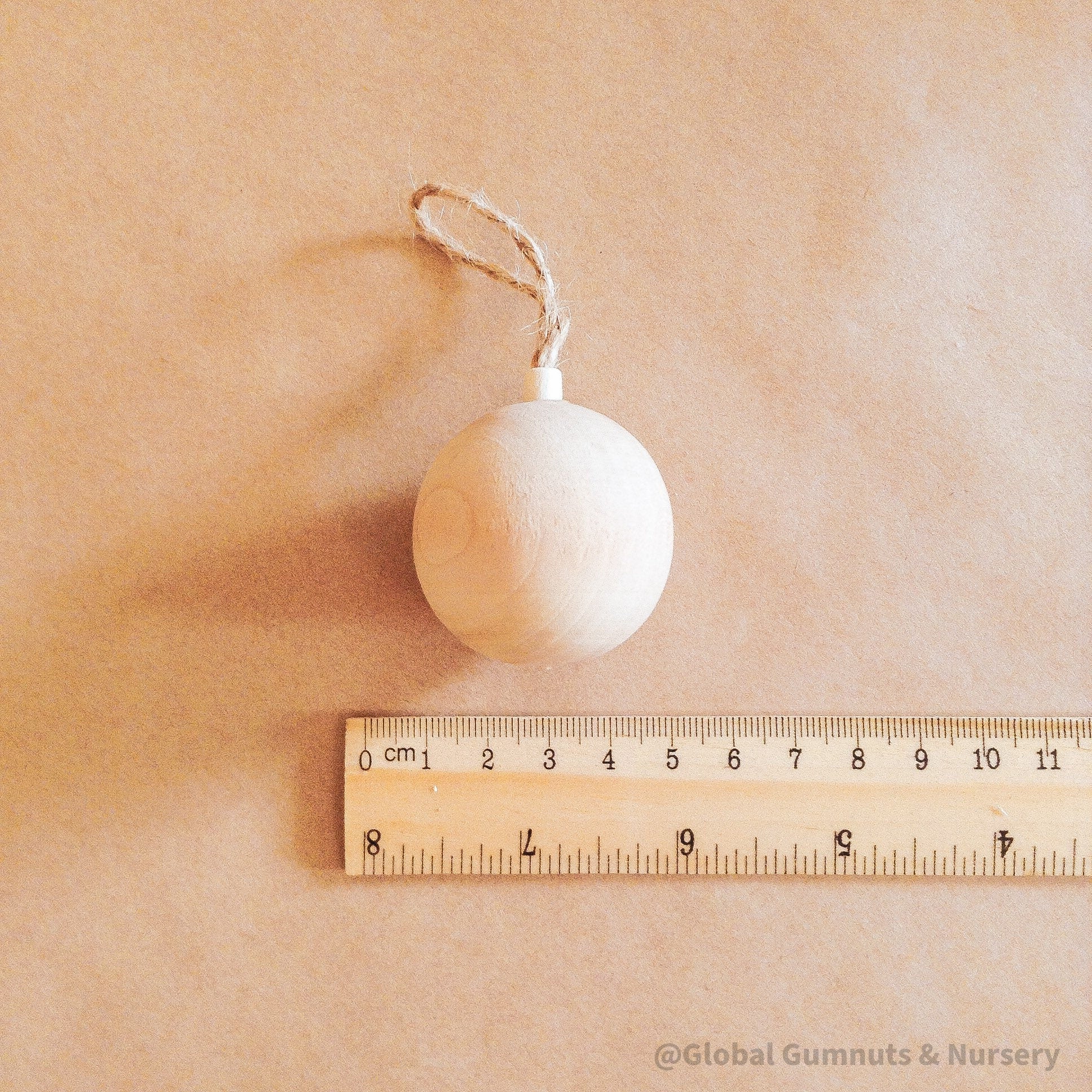 Wooden bell ornament, custom-made and personalized for Christmas.