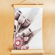 Pink flowering gum & gumnut canvas art, a charming decor piece.