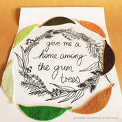A4-sized "A Home Among the Gumtrees" decor print, perfect for Australian-inspired wall art or nostalgic home accents.