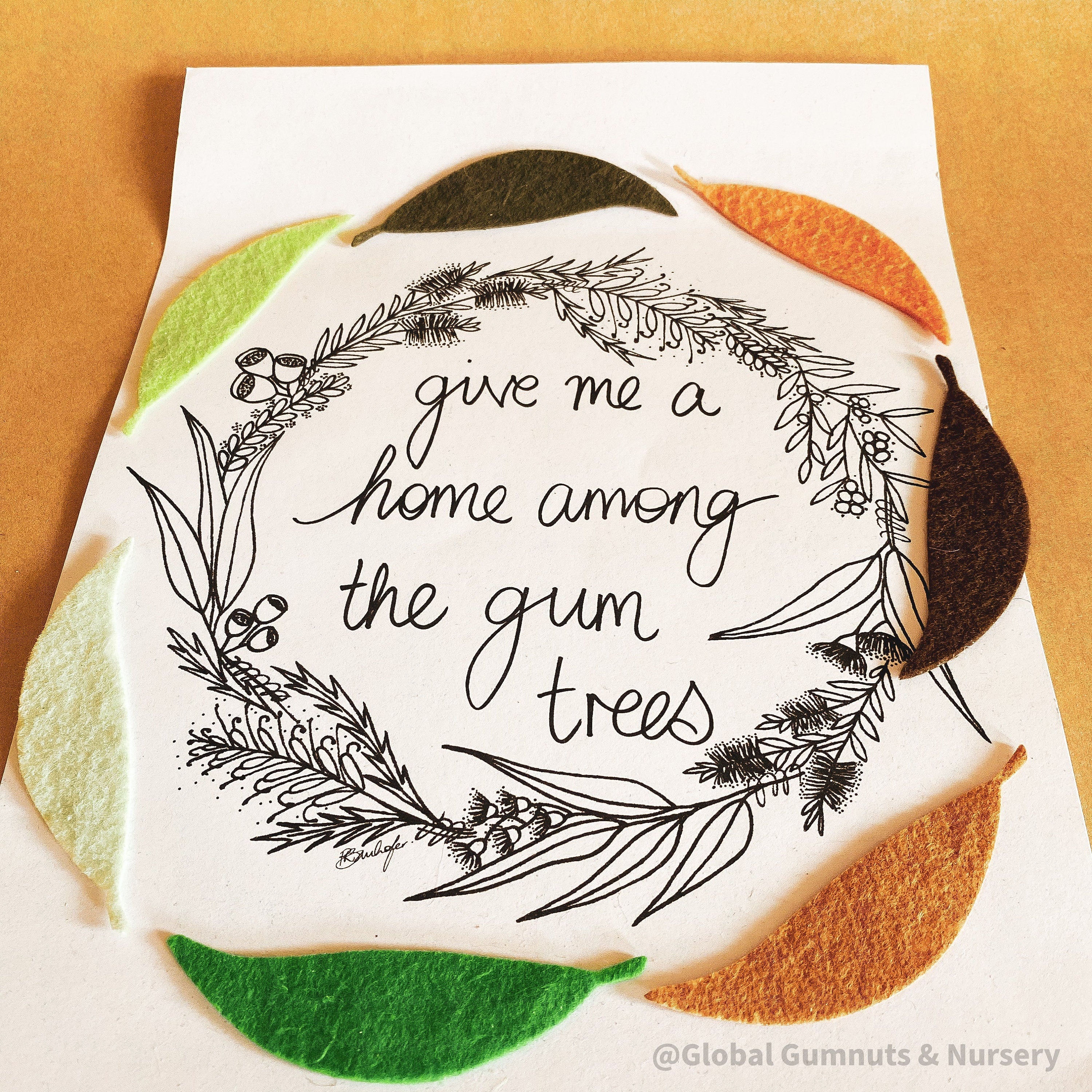 A4-sized "A Home Among the Gumtrees" decor print, perfect for Australian-inspired wall art or nostalgic home accents.