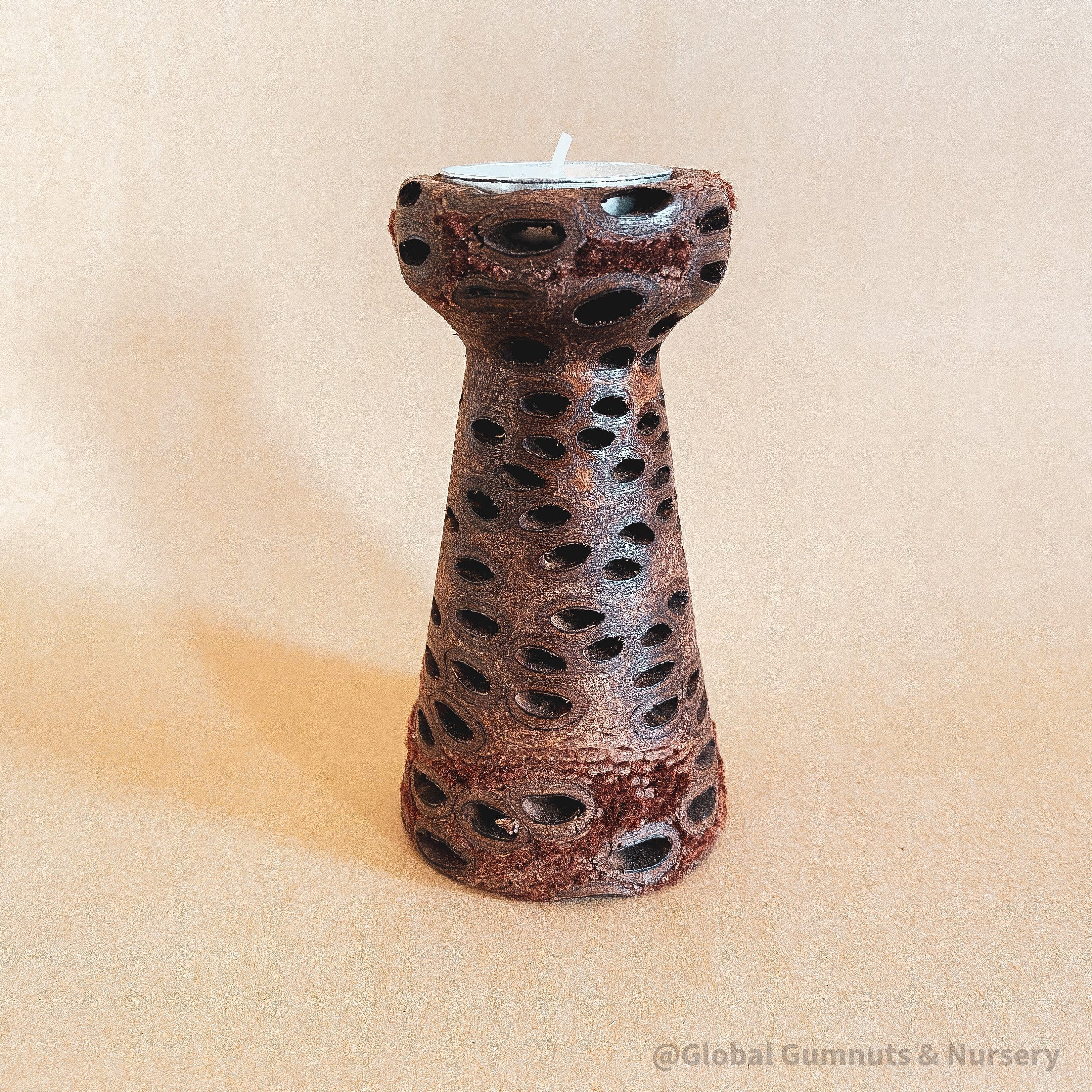 Tall Vase Banksia Tea Light Candle: Elegant banksia vase with tealight holder.