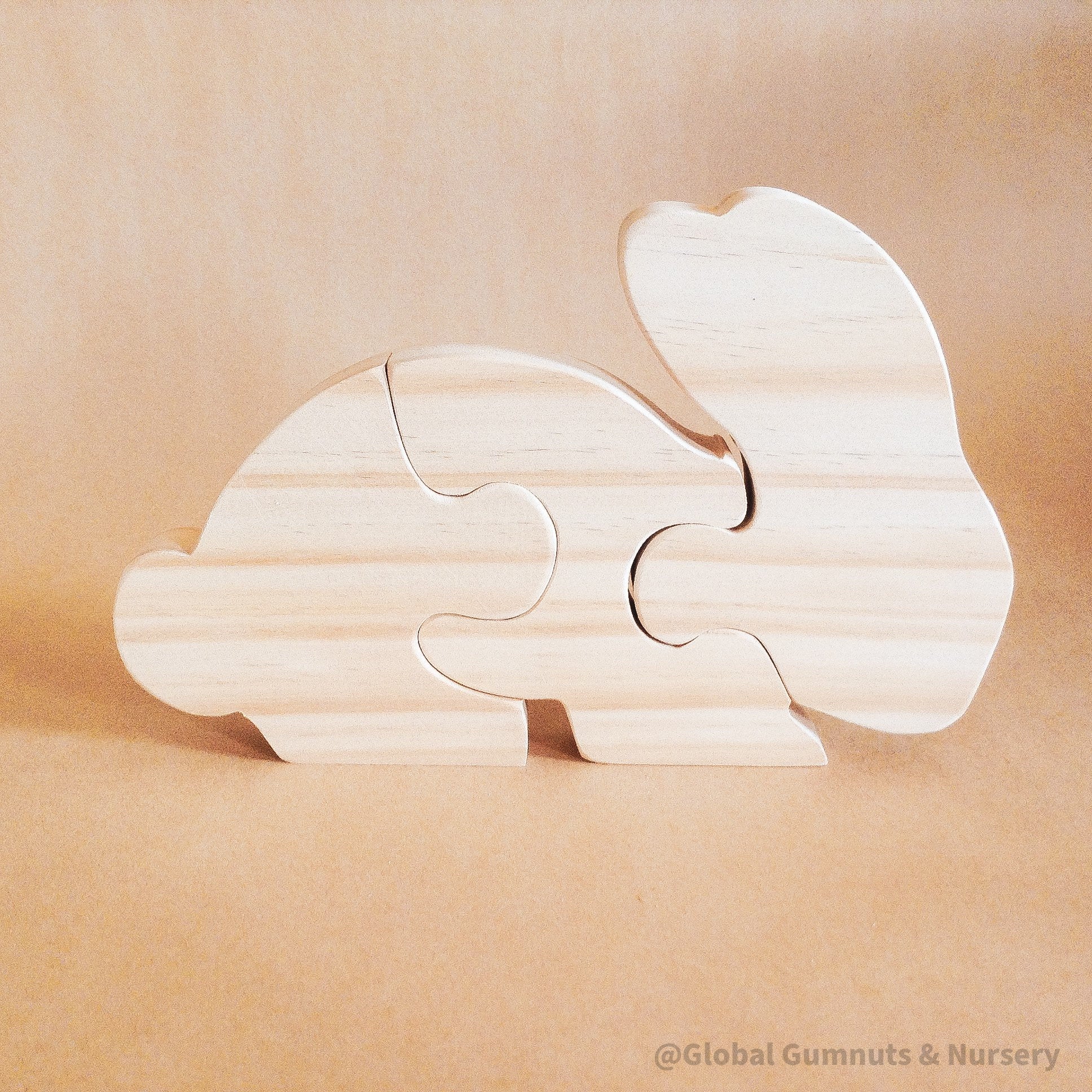Rabbit Puzzle – Eating Rabbit Design: Handcrafted wooden puzzle featuring a cute rabbit, perfect for Easter decorations or small world play.