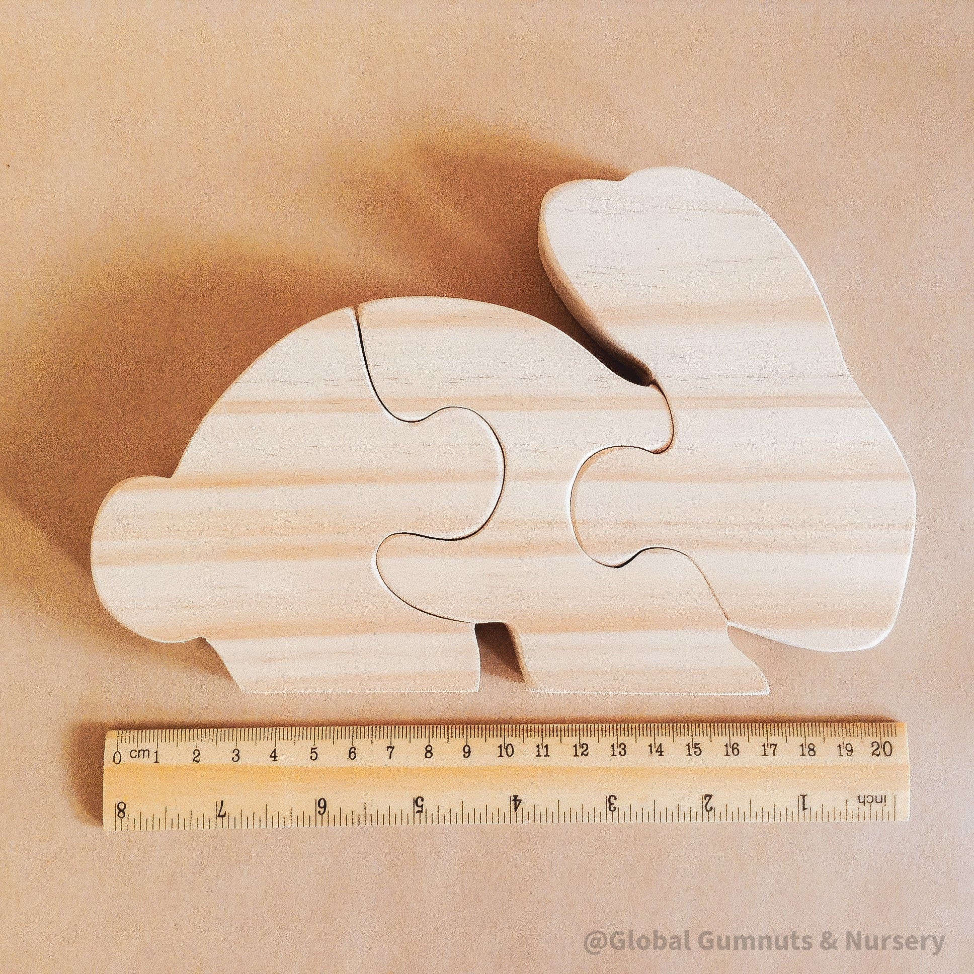 Rabbit Puzzle – Eating Rabbit Design: Handcrafted wooden puzzle featuring a cute rabbit, perfect for Easter decorations or small world play.