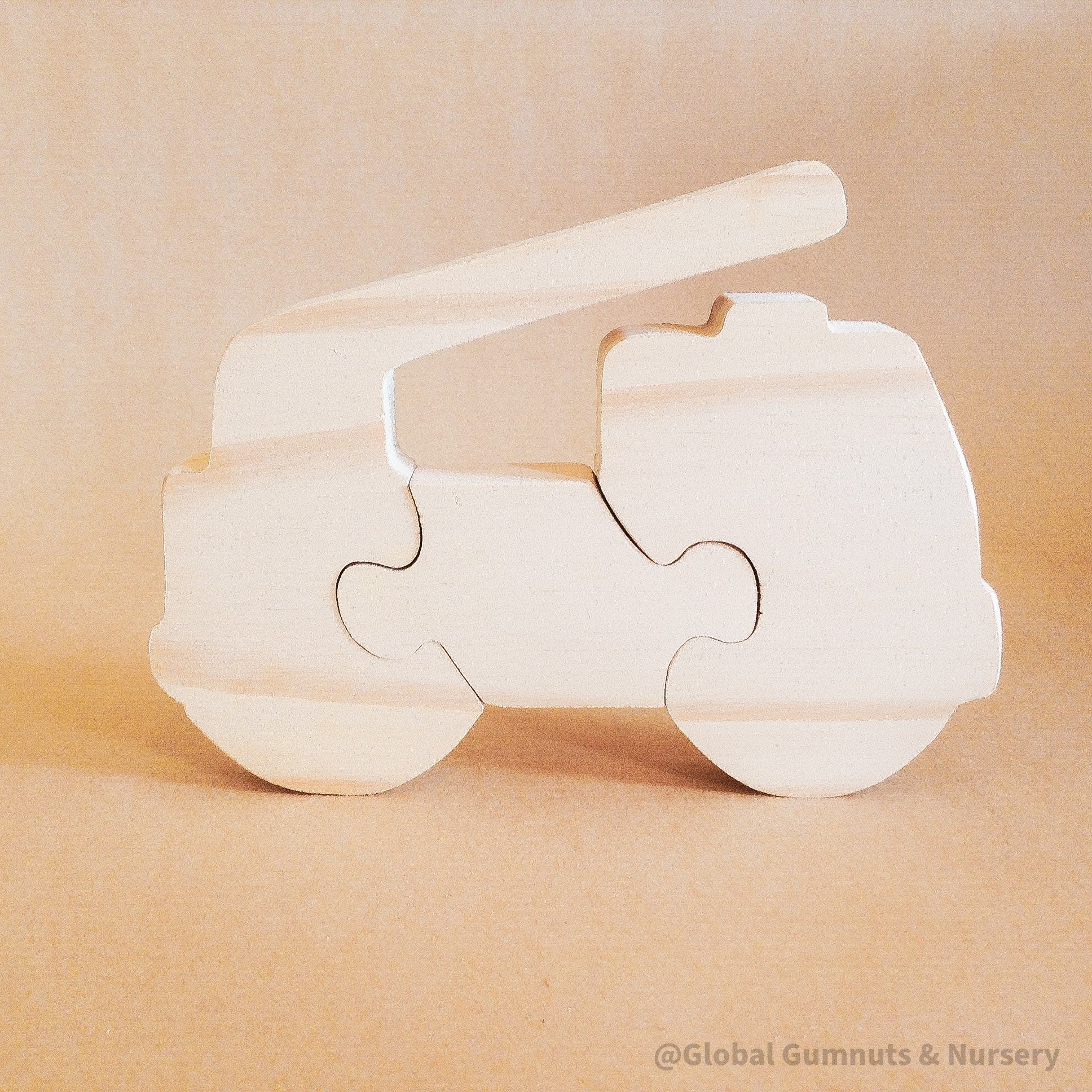 Handmade Wooden Truck Puzzle: Playful wooden truck puzzle, ideal as a gift or learning toy.