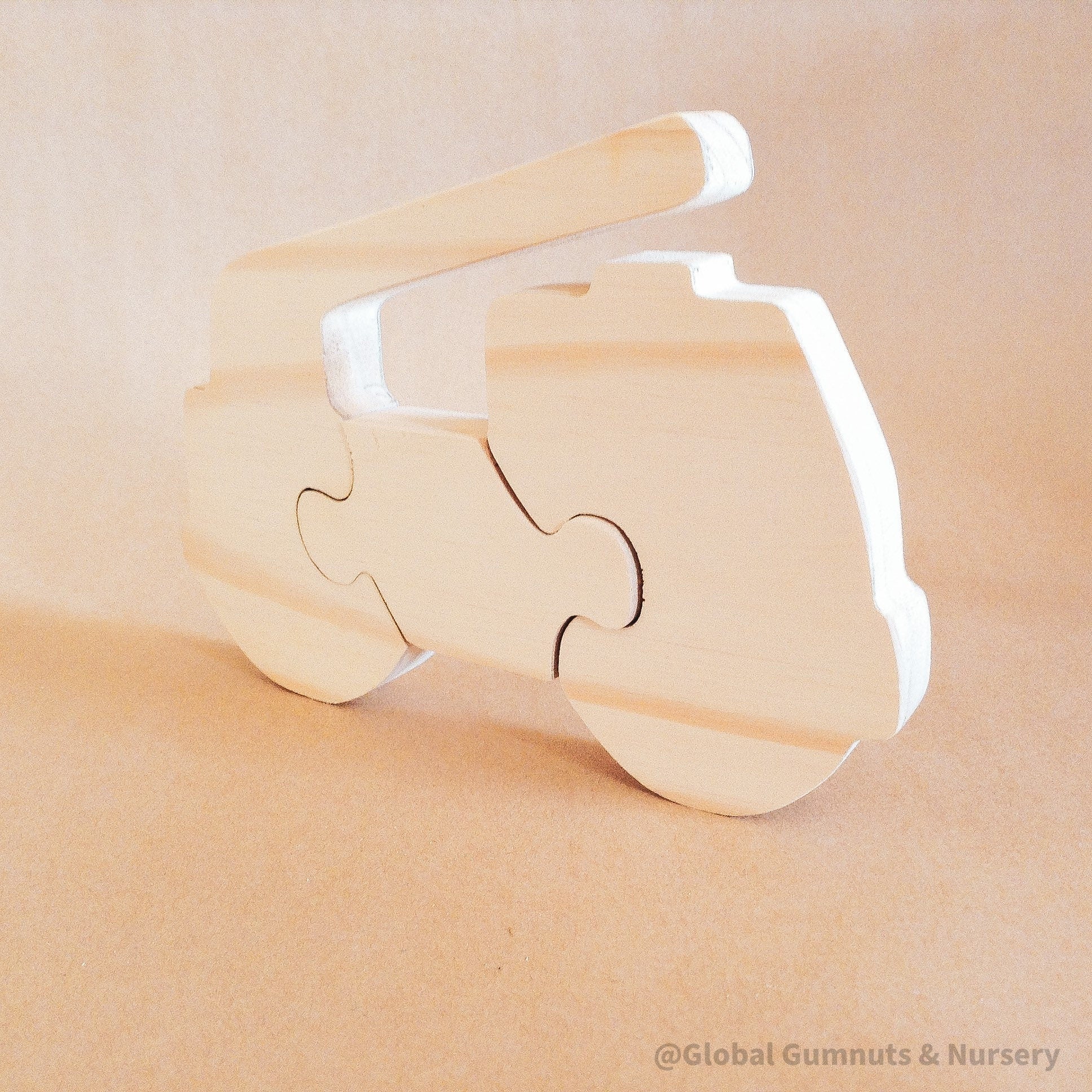 Handmade Wooden Truck Puzzle: Playful wooden truck puzzle, ideal as a gift or learning toy.