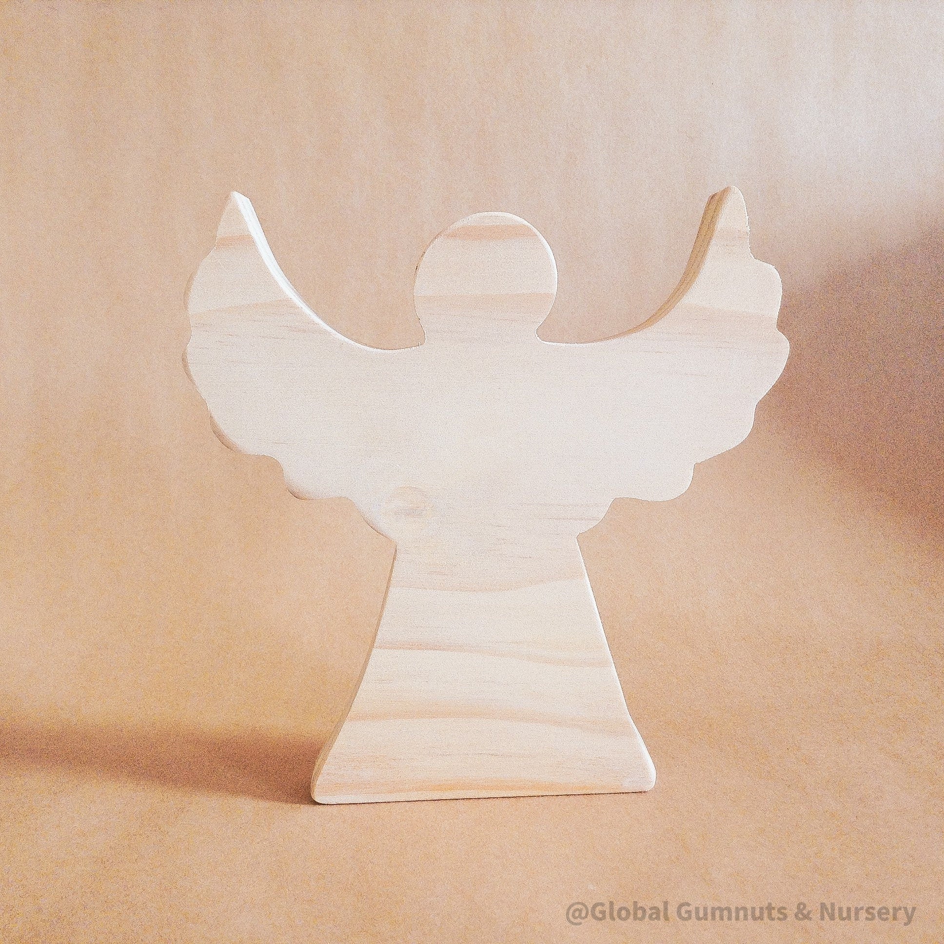 Handmade Wooden Angel: Wooden angel with movable wings, ideal for decor or gifts.