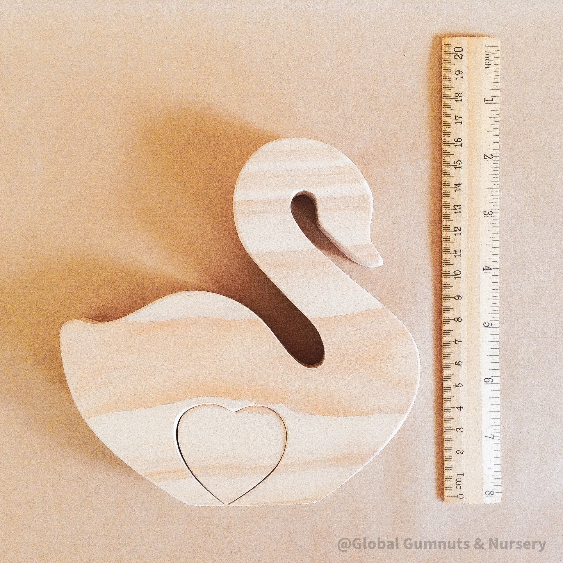 Wooden black swan puzzle toy, handmade and one-of-a-kind.