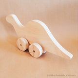 Juguete de dinosaurio de madera personalizado