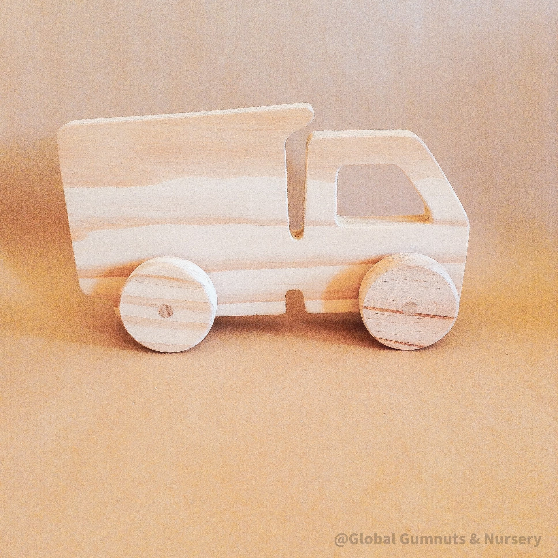 Personalized Wooden Truck: Sustainable wooden truck toy with customization.