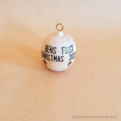 Wooden bell Christmas ornament with chimes, perfect for festive tree decor or rustic holiday charm.
