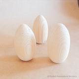 Œuf en bois à fond plat