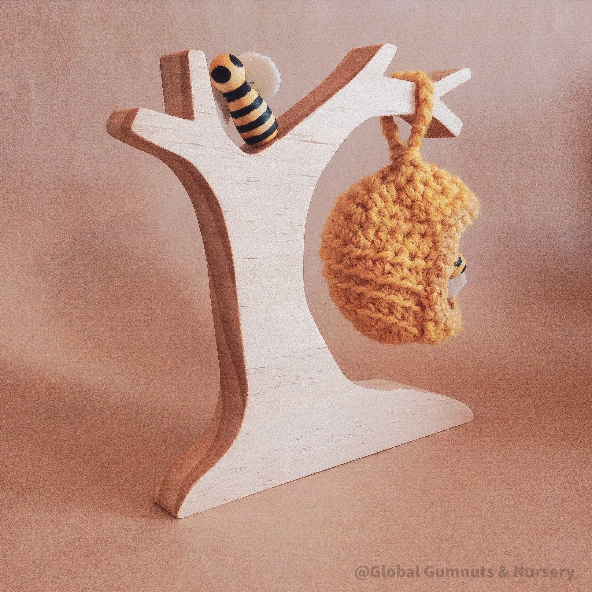 Natural Wooden Beehive Crochet Tree: A wooden crochet tree resembling a beehive, perfect for decor, crafts, or children’s creative play.