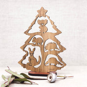 Small Australian Christmas tree scene (Gumtree) with stand, perfect for festive decor.