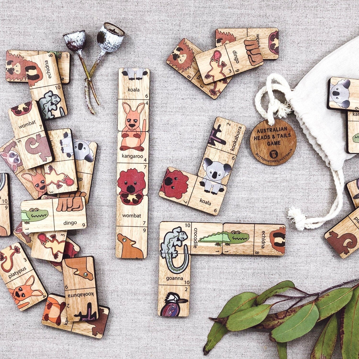 Heads and Tails game featuring Australian native animals, a wooden Montessori toy for fun learning.