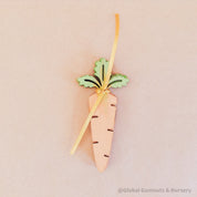 Wooden Carrots: Eco-friendly, water-coloured wooden carrots.