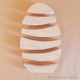 Apilador de huevos de madera natural