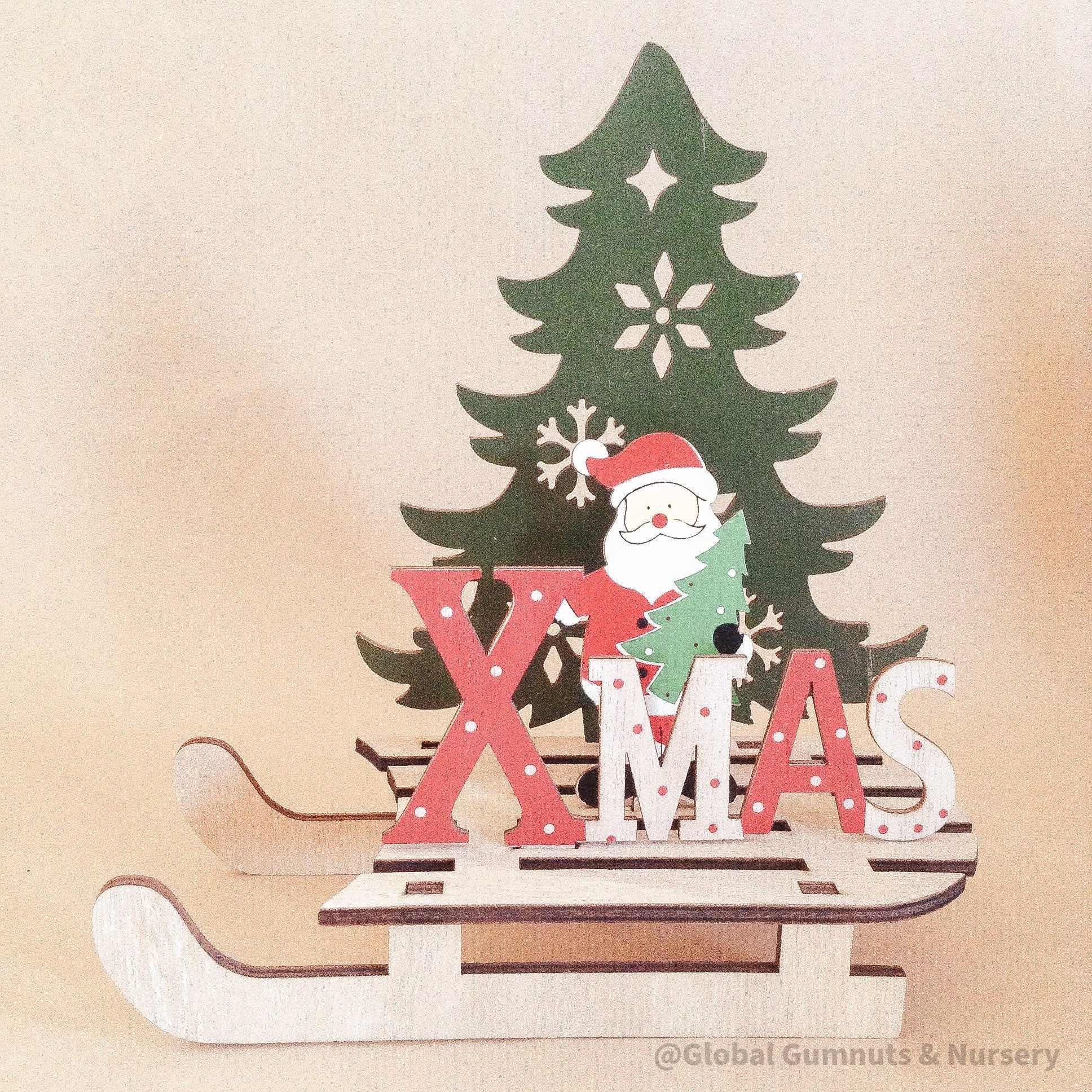 Wooden Christmas sleigh, perfect for imaginative holiday play or as a festive decoration.