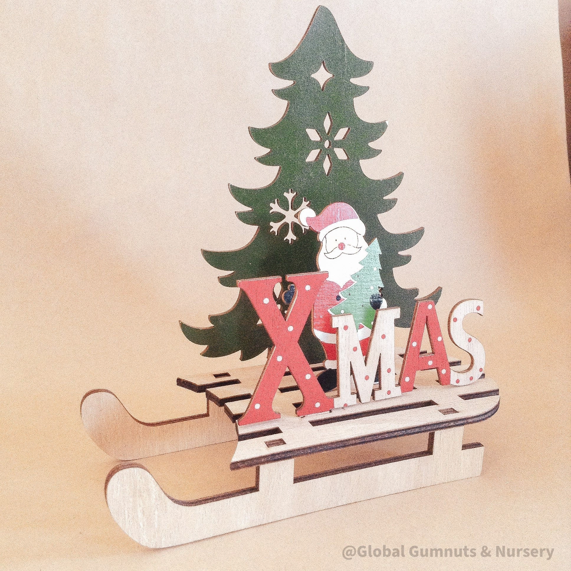 Wooden Christmas sleigh, perfect for imaginative holiday play or as a festive decoration.