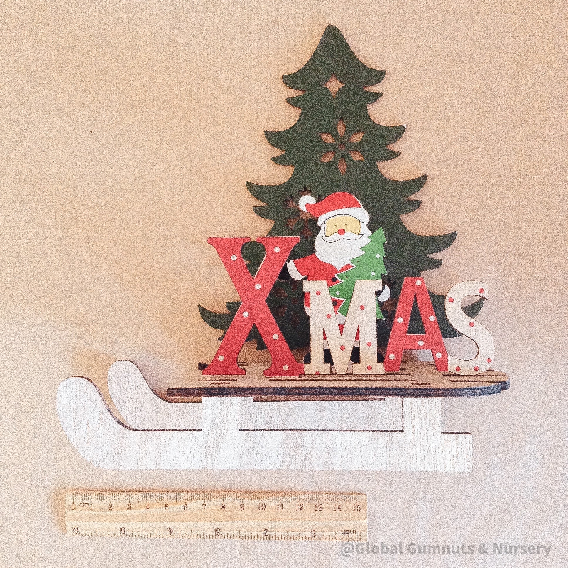 Wooden Christmas sleigh, perfect for imaginative holiday play or as a festive decoration.