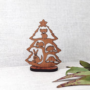 Small Australian Christmas tree scene (Gumtree) with stand, perfect for festive decor.