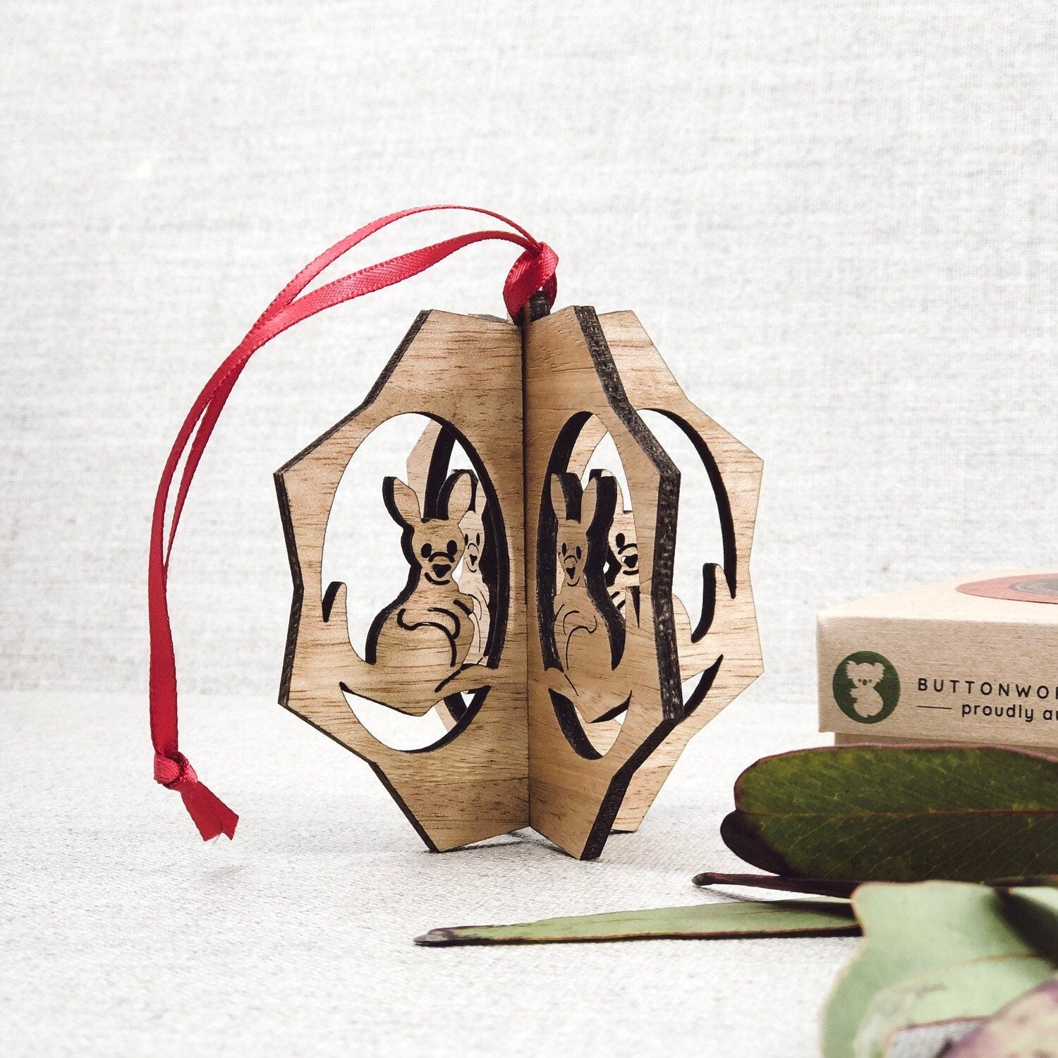 Kangaroo-shaped bauble decoration, an Australian-inspired ornament for tree or gift embellishment.