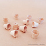 Macetas de madera en miniatura